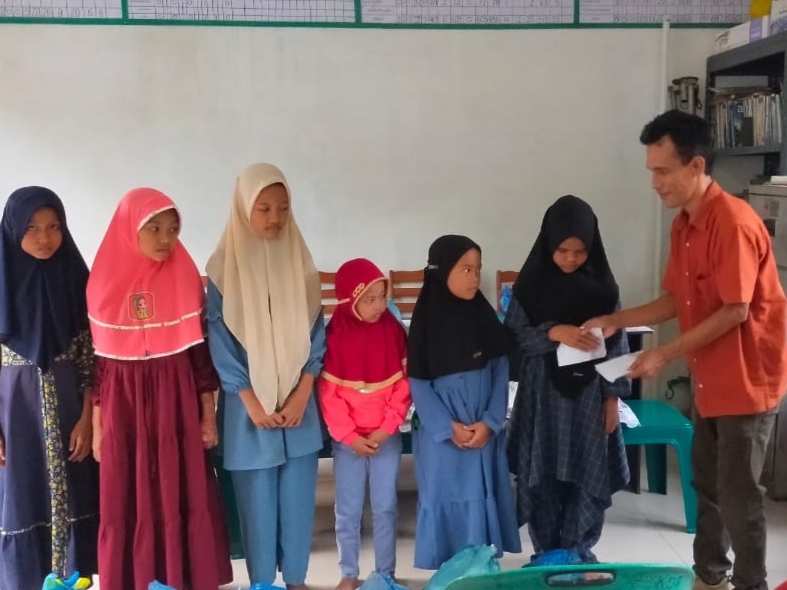 Kades Adian Torop Kaharuddin Apresiasi PT Socfindo Santuni Anak Yatim Program Ramadhan Berkah